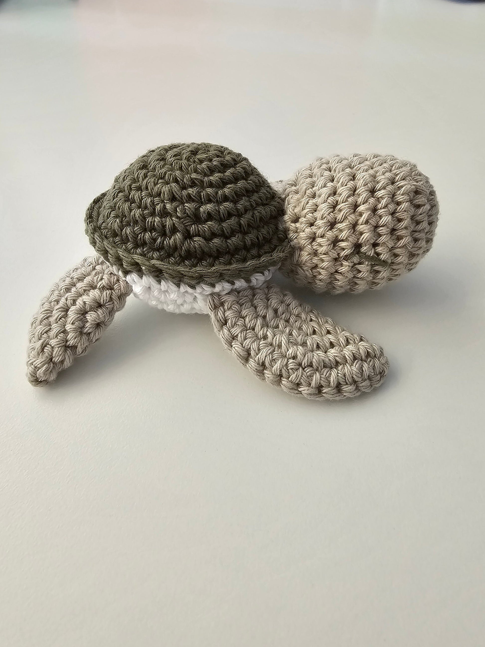 SCHILDI Rassel Naturspielzeug Kaki