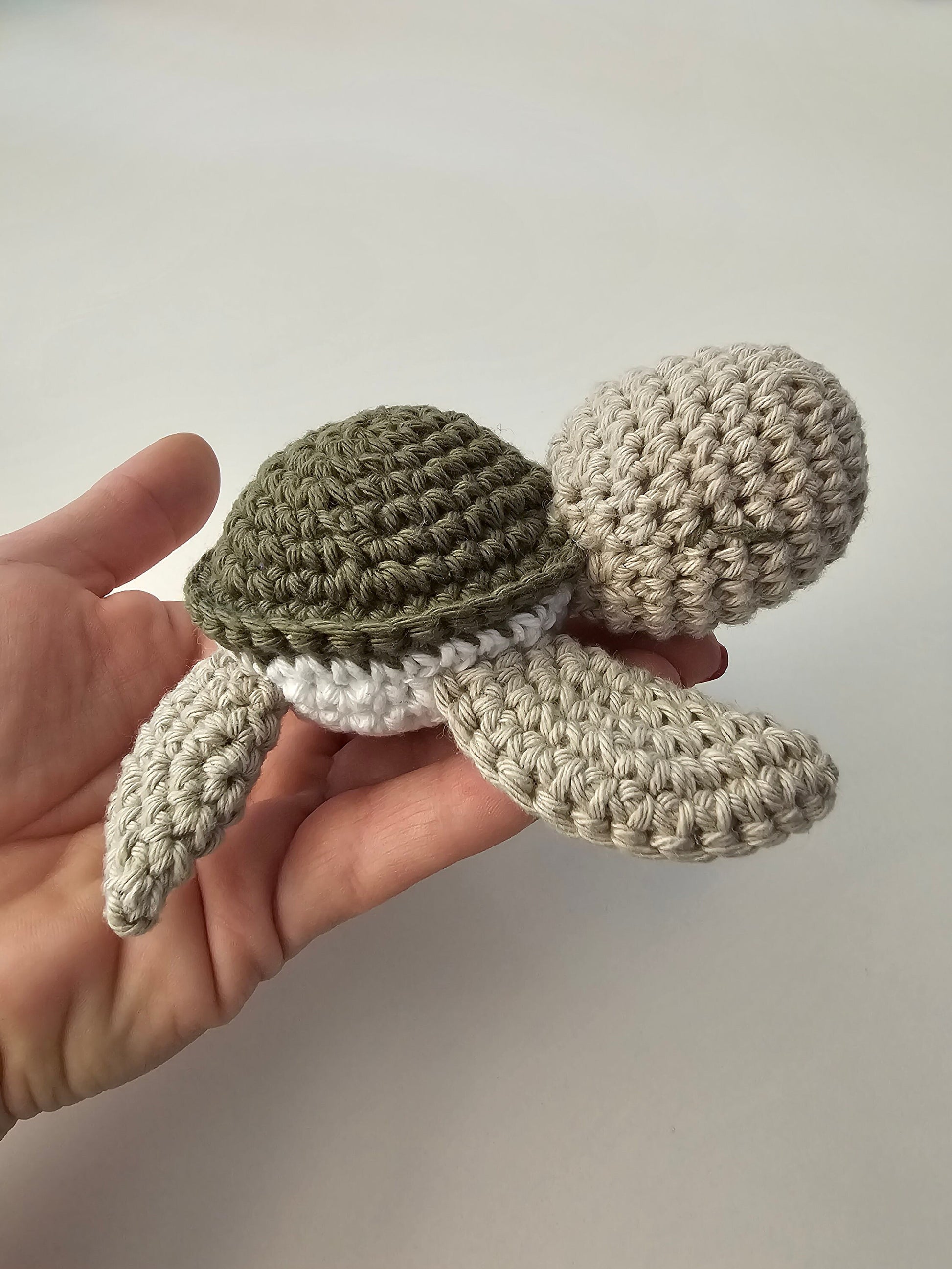 SCHILDI Rassel Naturspielzeug Kaki