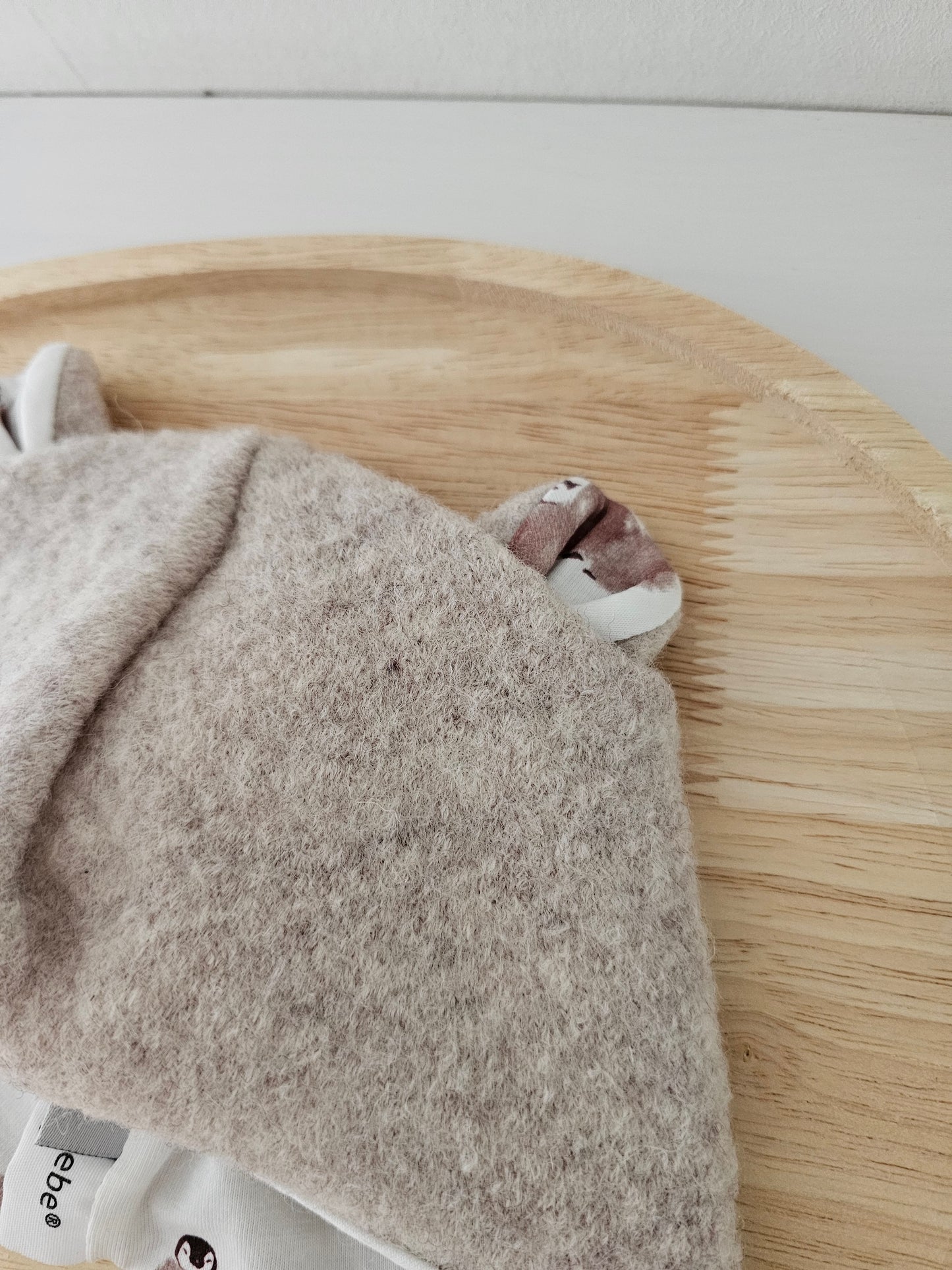 Wollwalk Bärenmütze beige meliert